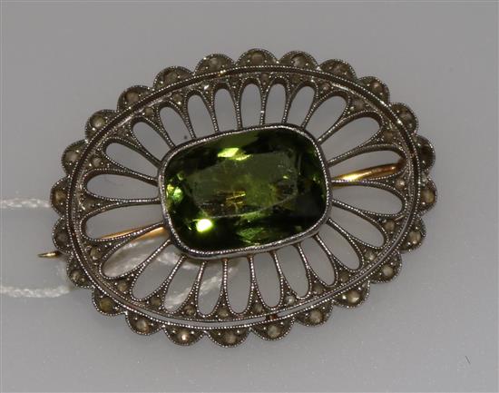 An early 20th century pierced gold, rose cut diamond and green paste set oval brooch, 34mm.